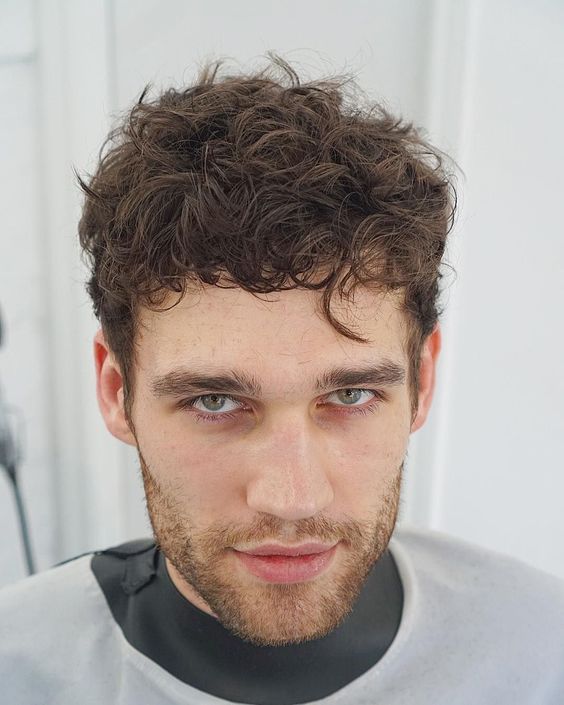 Curly layered men's hairstyle