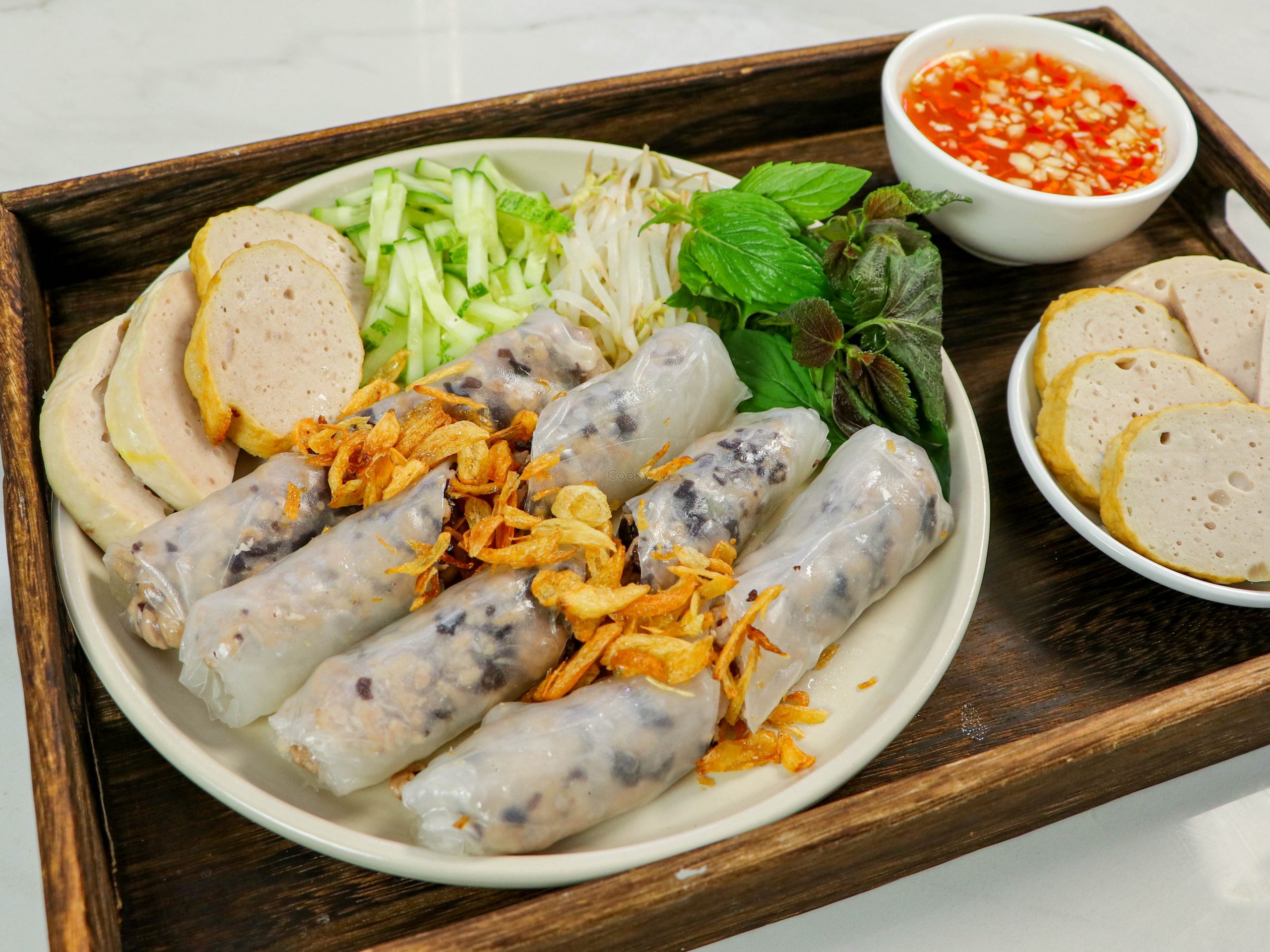 Top 20 must-try dishes in Ho Chi Minh City: Banh uot, Banh cuon - Steamed rice pancake stuffed with minced pork