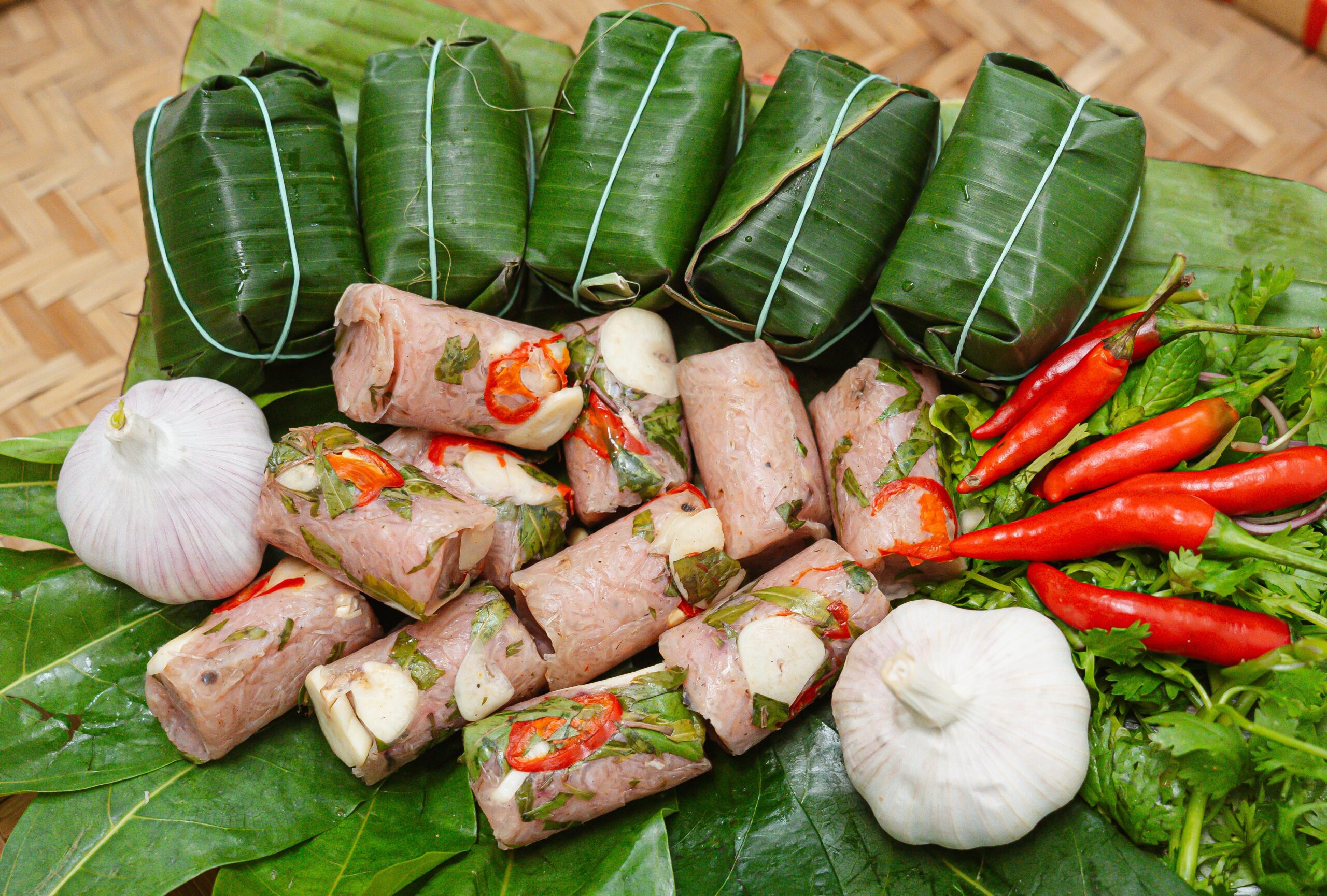 Top 10 unusual foods to try in Vietnam: Nem Chua (Vietnamese Fermented Pork Roll)
