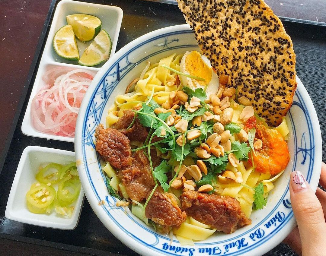 Top 20 must-try dishes in Ho Chi Minh City: Mi Quang - Quang style noodle with pork and shrimp