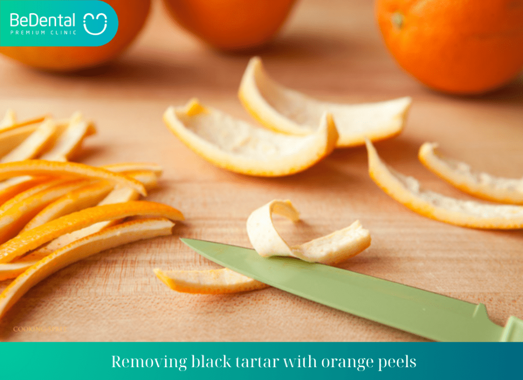 Removing black tartar with orange peels