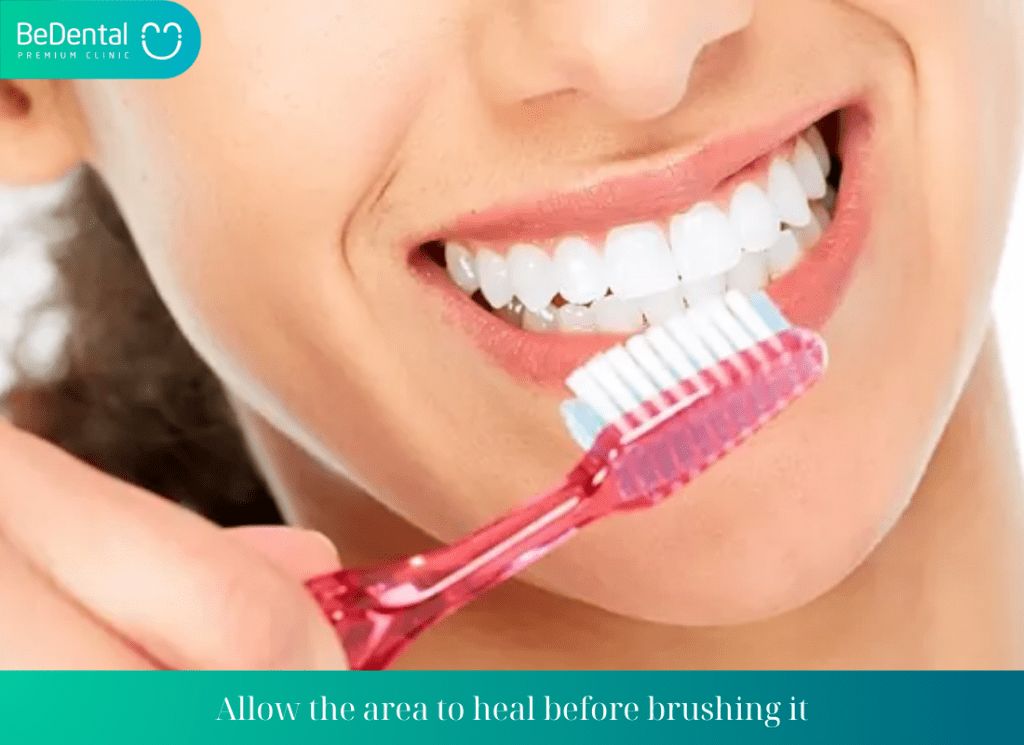 Allow the area to heal before brushing it