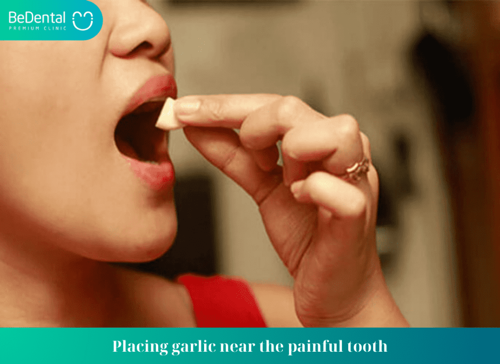 Placing garlic near the painful tooth